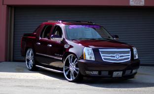 Cadillac on 2010 Burgundy Cadillac Escalade Ext With 28  Chrome And Purple Lss 55